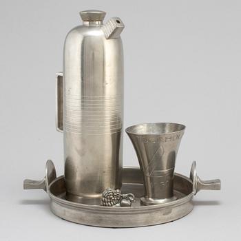 Four Swedish pewter items, 1930s.