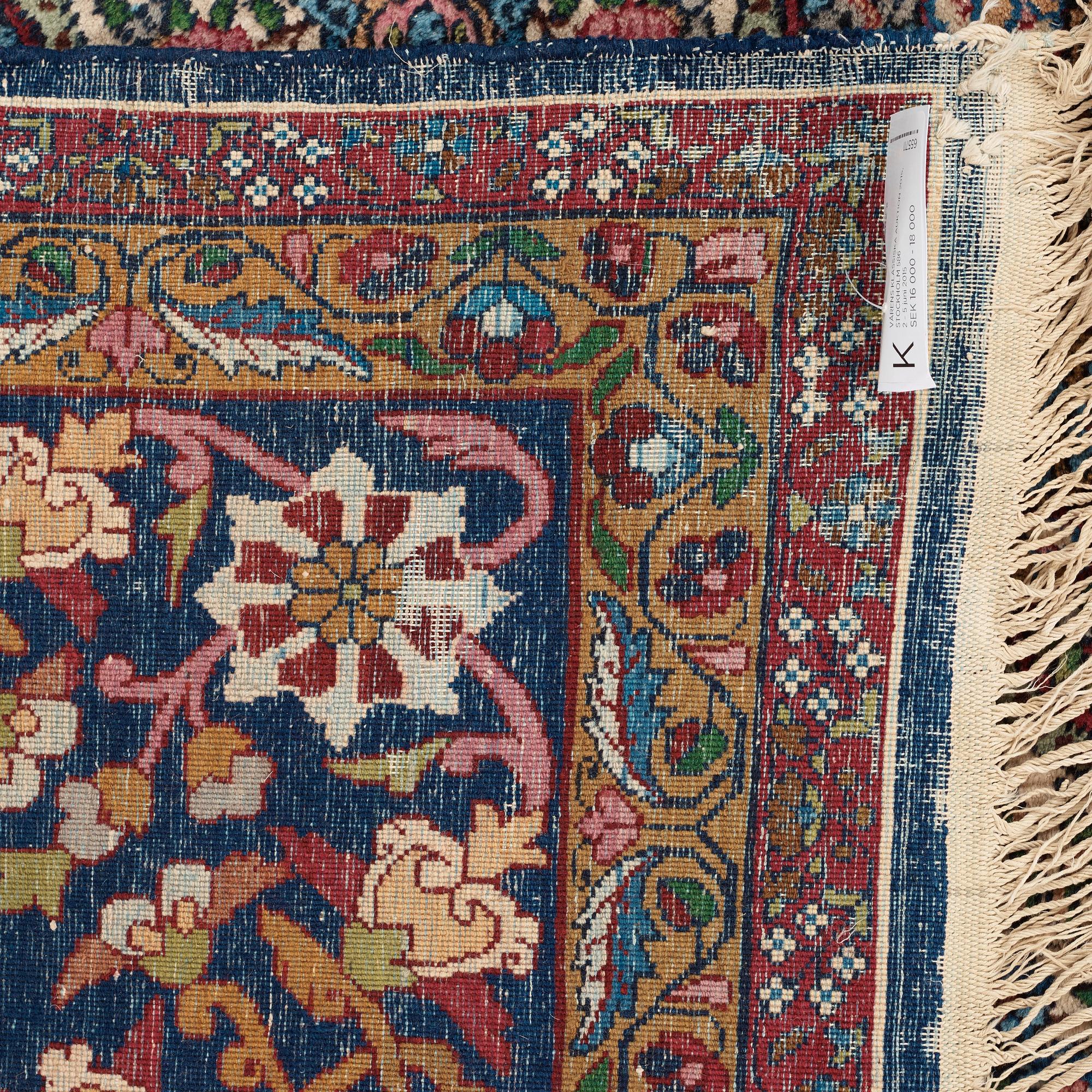 CARPET. Semi-Antique Kerman. 382 x 286,5 cm.