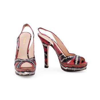 863. PRADA, a pair of embossed red leather sandals.