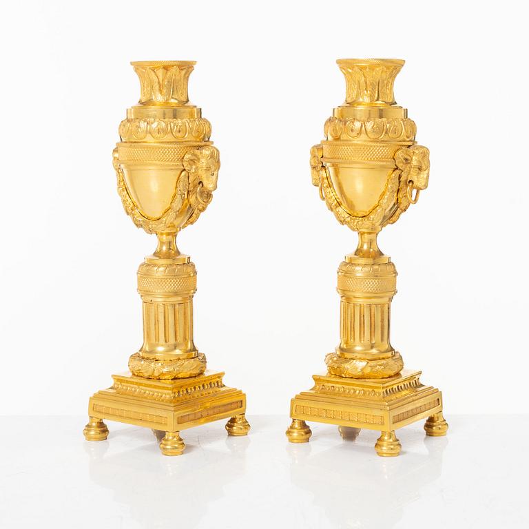 A pair of French Louis XVI style gilt-bronze casolettes, later part 18th century.