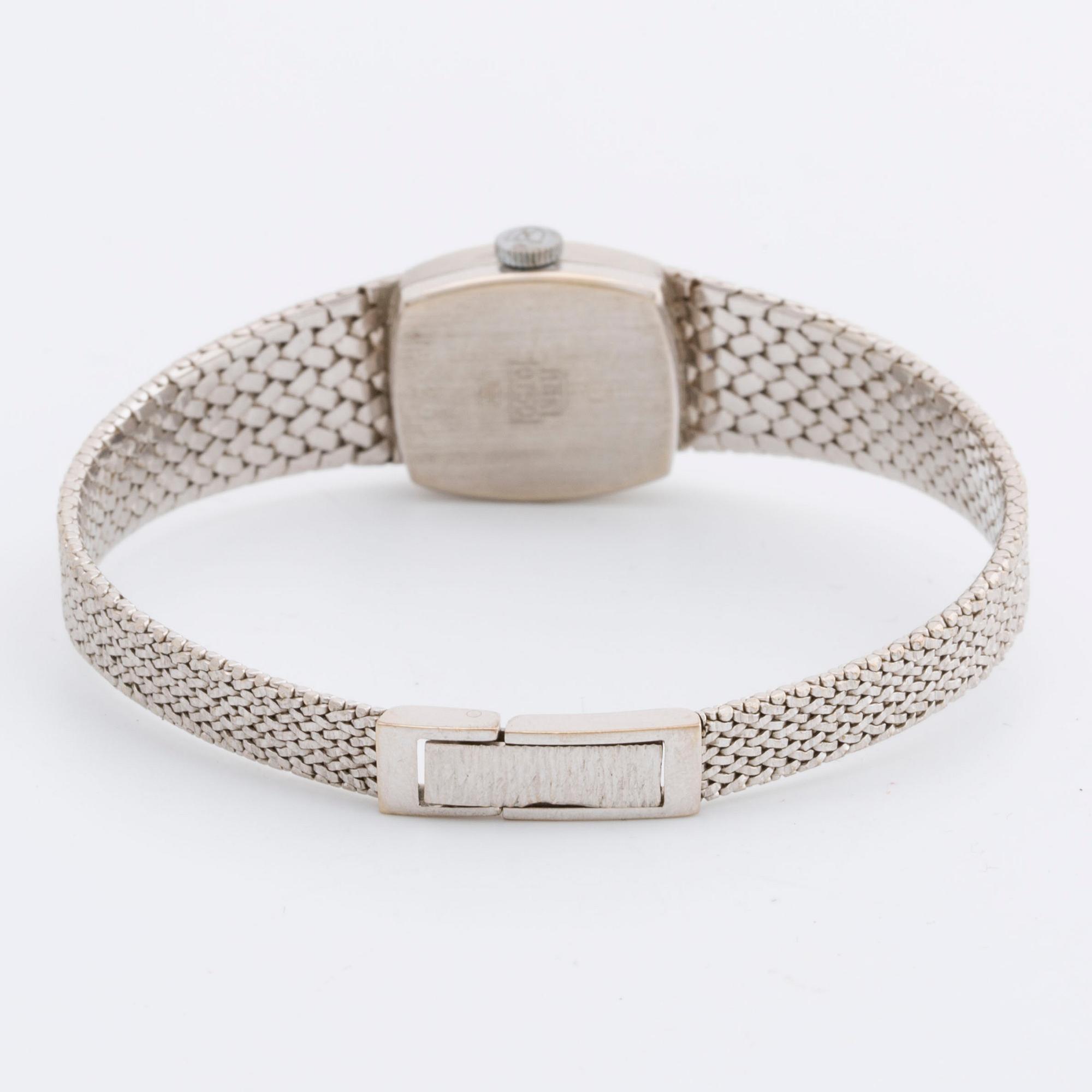 DAMARBANDSUR MOWADO, 18K vitguld, 15 x 17 mm, manuellt verk.