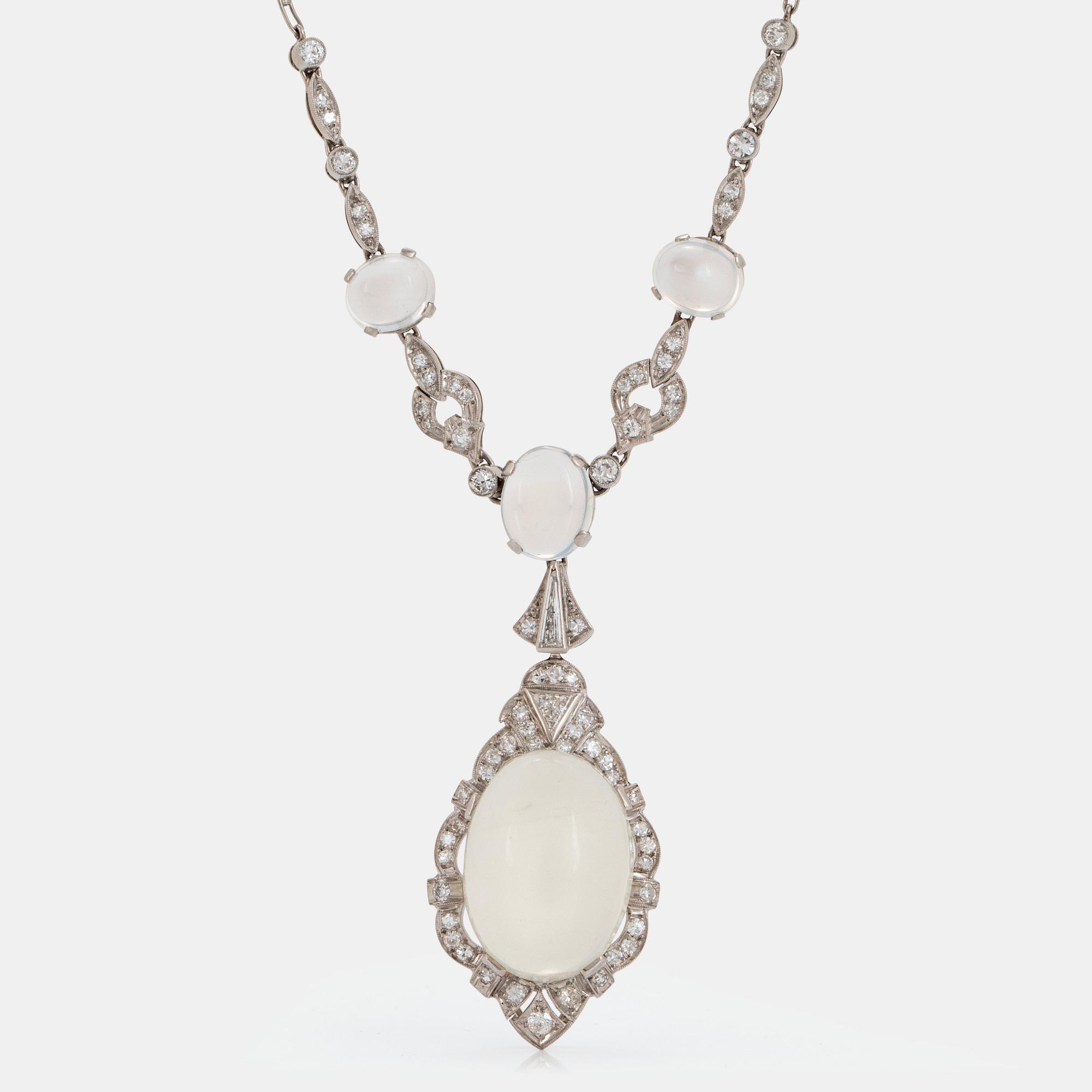 A platinum necklace set with moonstones and old- and eight-cut diamonds.