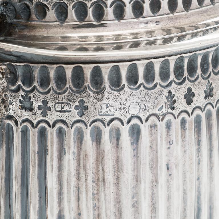 A sterling silver jug, London, unidentified marks.