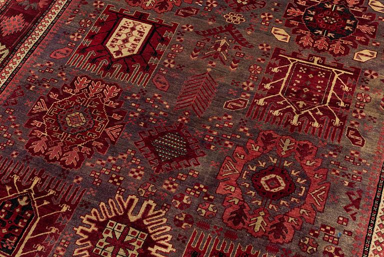 An antique Agra carpet of 'Timuri Baluch' design, Northern India, c. 265 x 181 cm.