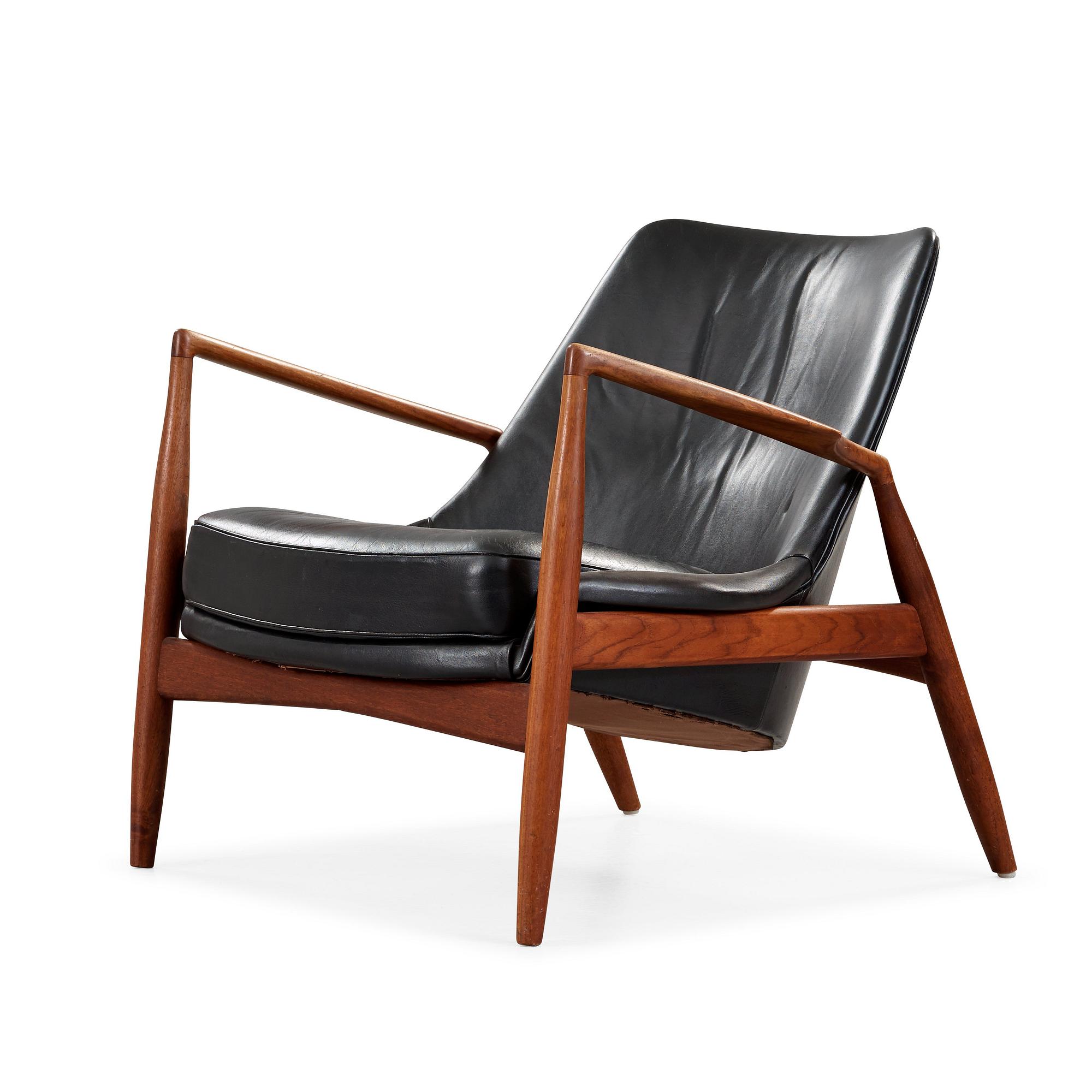 Ib Kofod-Larsen, a 'Seal' teak and black leather armchair, Olof Persson Möbler, Jönköping, Sweden 1950's-60's.