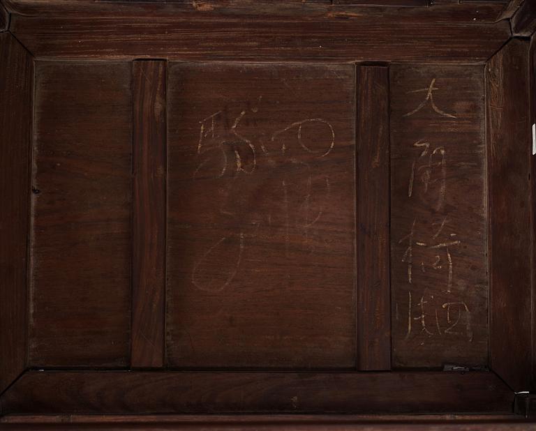 A pair of Chinese hardwood chairs, late Ming dynasty.