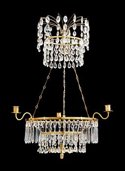 A Gustavian-style four light chandelier.
