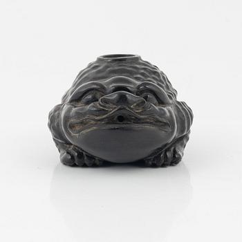 A wooden brushpot in the shape of a three legged toad, China, 20th Century.