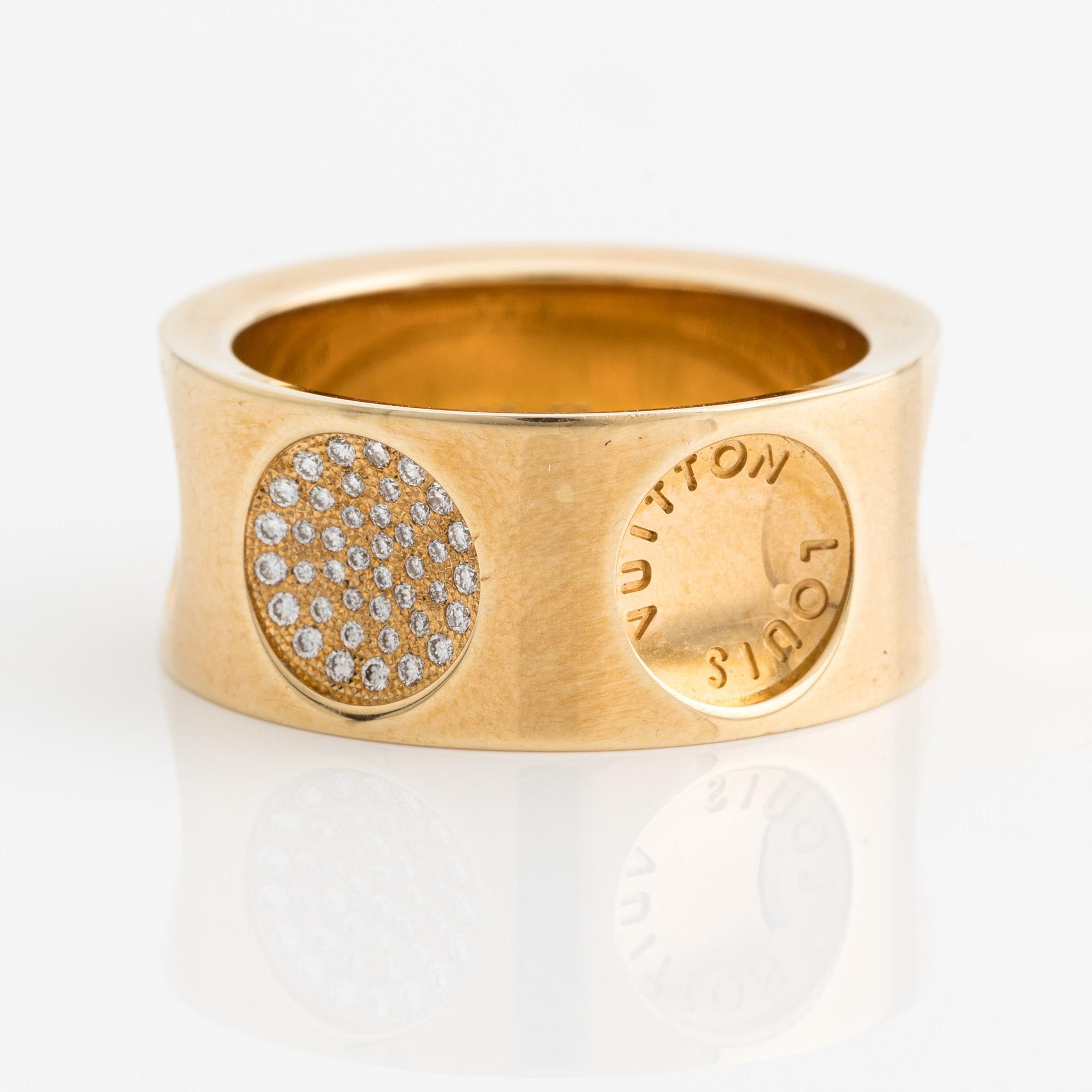Louis Vuitton, an 18K gold 'Empreinte' ring with diamonds.