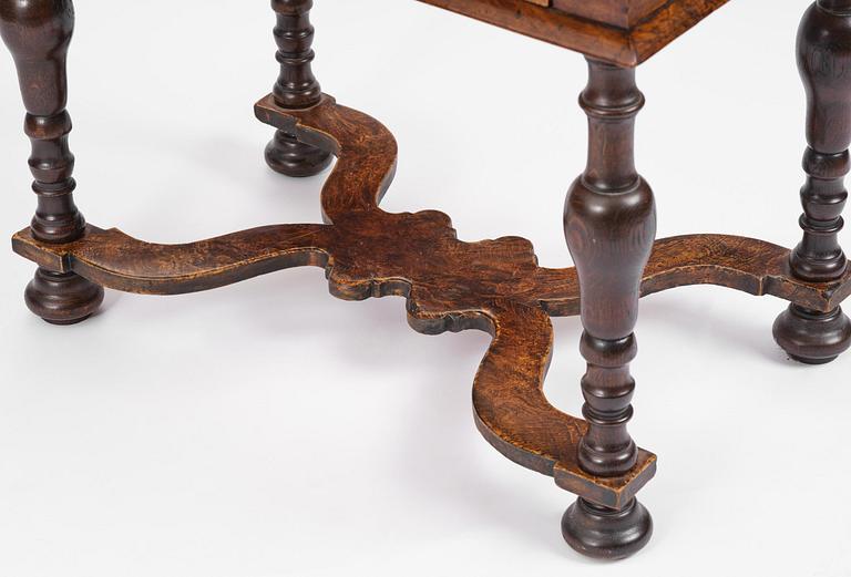 A Swedish late baroque burr-alder table, Stockholm, first part 18th century.