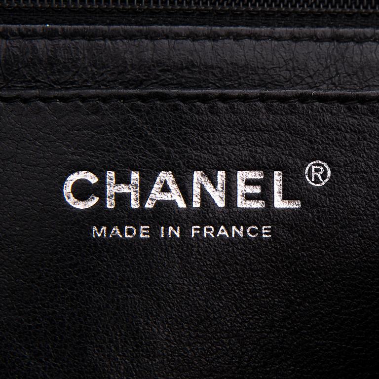 CHANEL Caviar Reissue 2.55 Jumbo Single Flap Bag.