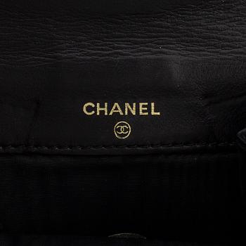 CHANEL, a caviar leather wallet.