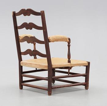 A Swedish Royal "Gripsholm" armchair.