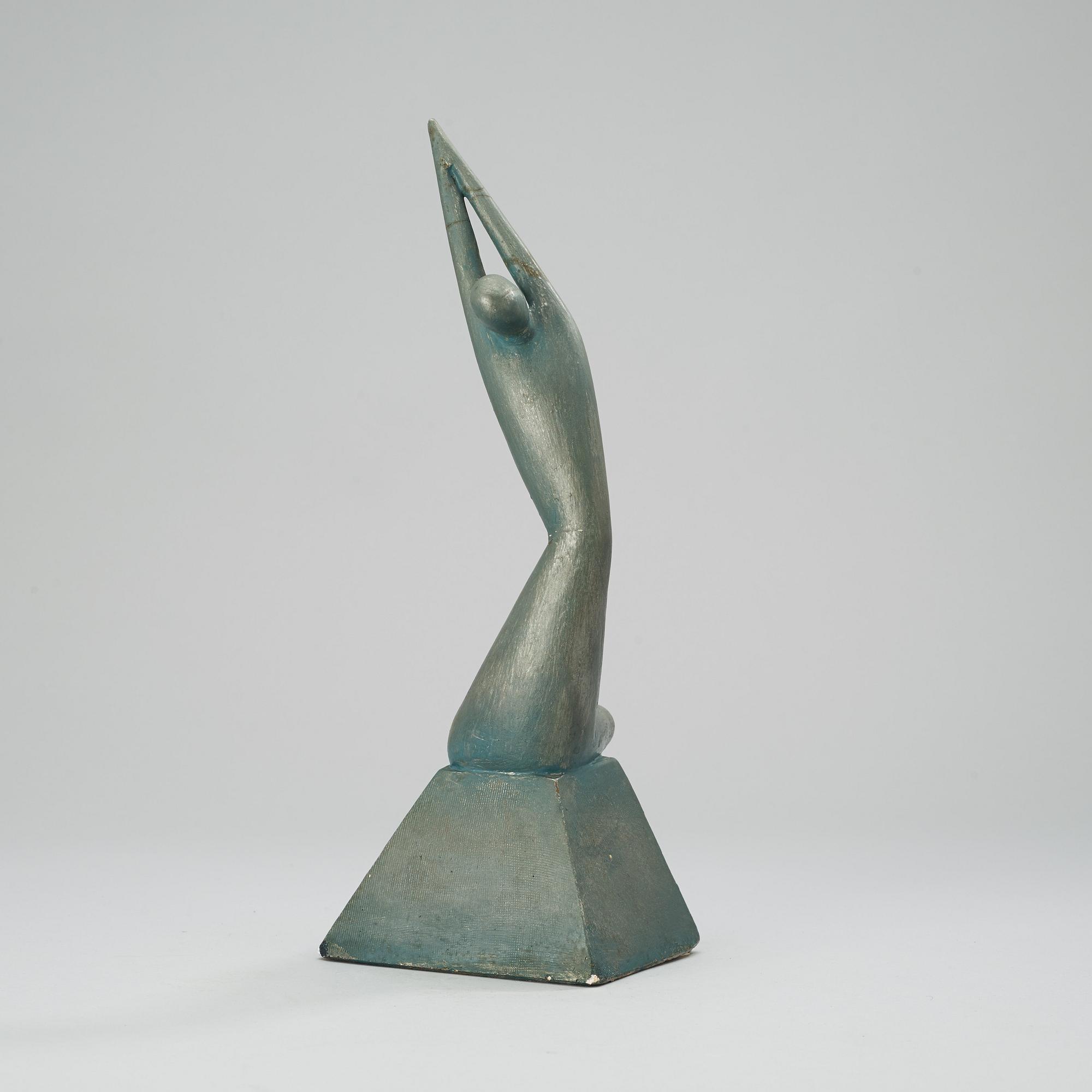 A Wiwen Nilsson painted plaster sculpture of a seated woman, ca 1925.