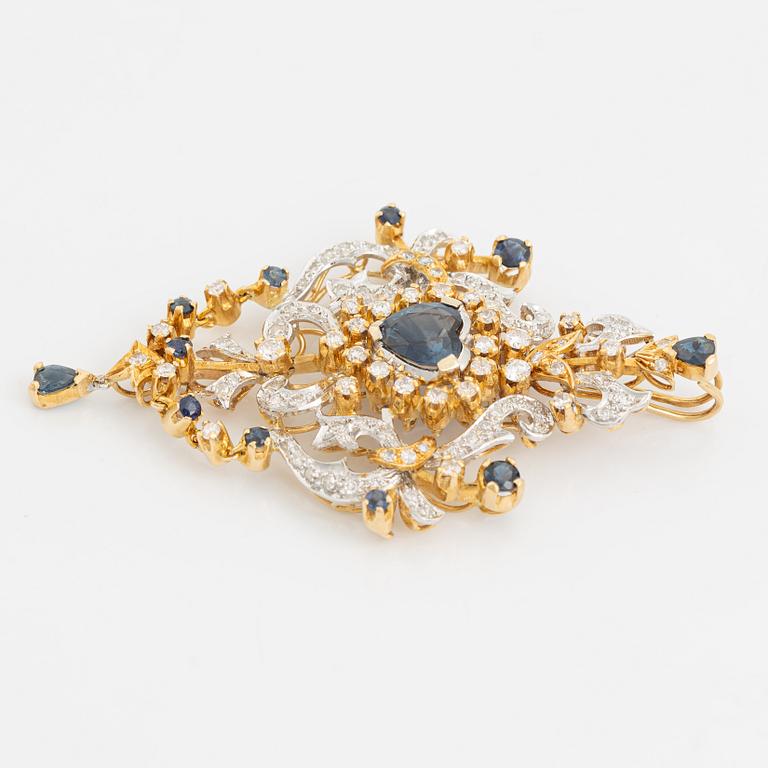 Pendant, 18K gold with blue sapphires and brilliant- and eight cut diamonds.