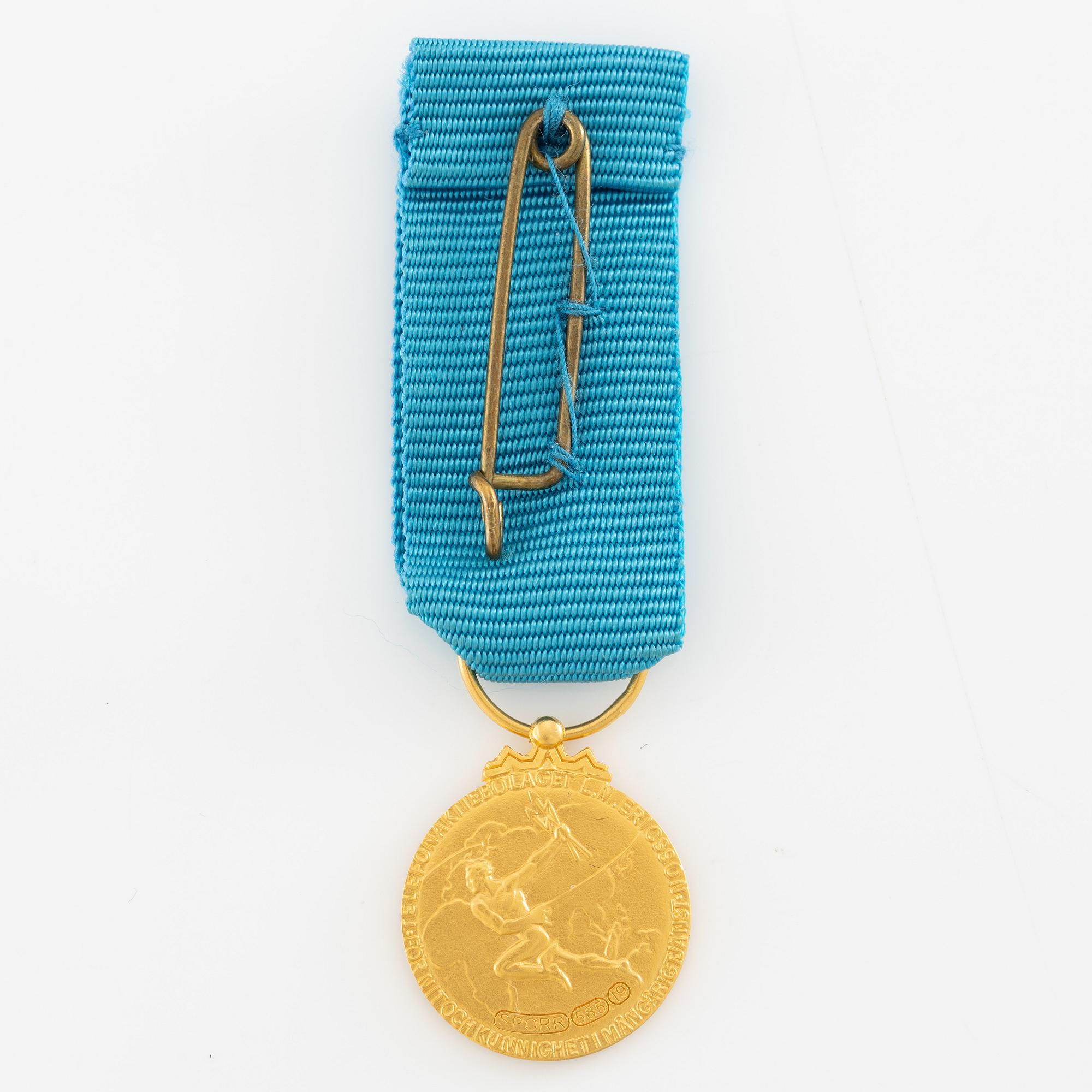 Medal, 14k gold, LM Ericsson, for merit and skill.