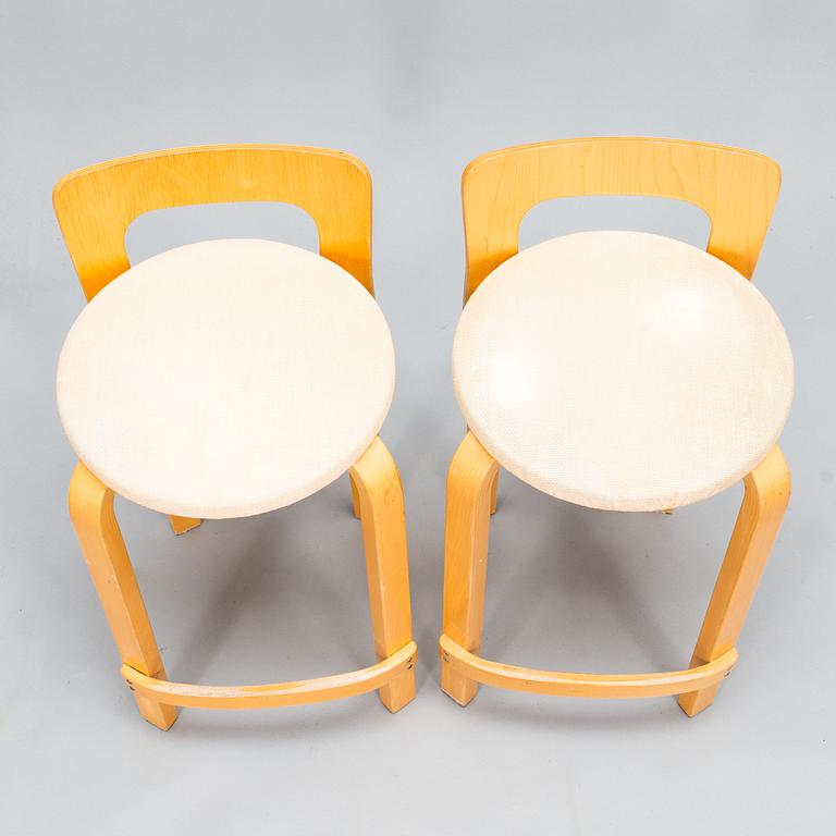 Alvar Aalto, Alvar Aalto, A pair of K65 bar stools, Artek, Finland, late 20th century.