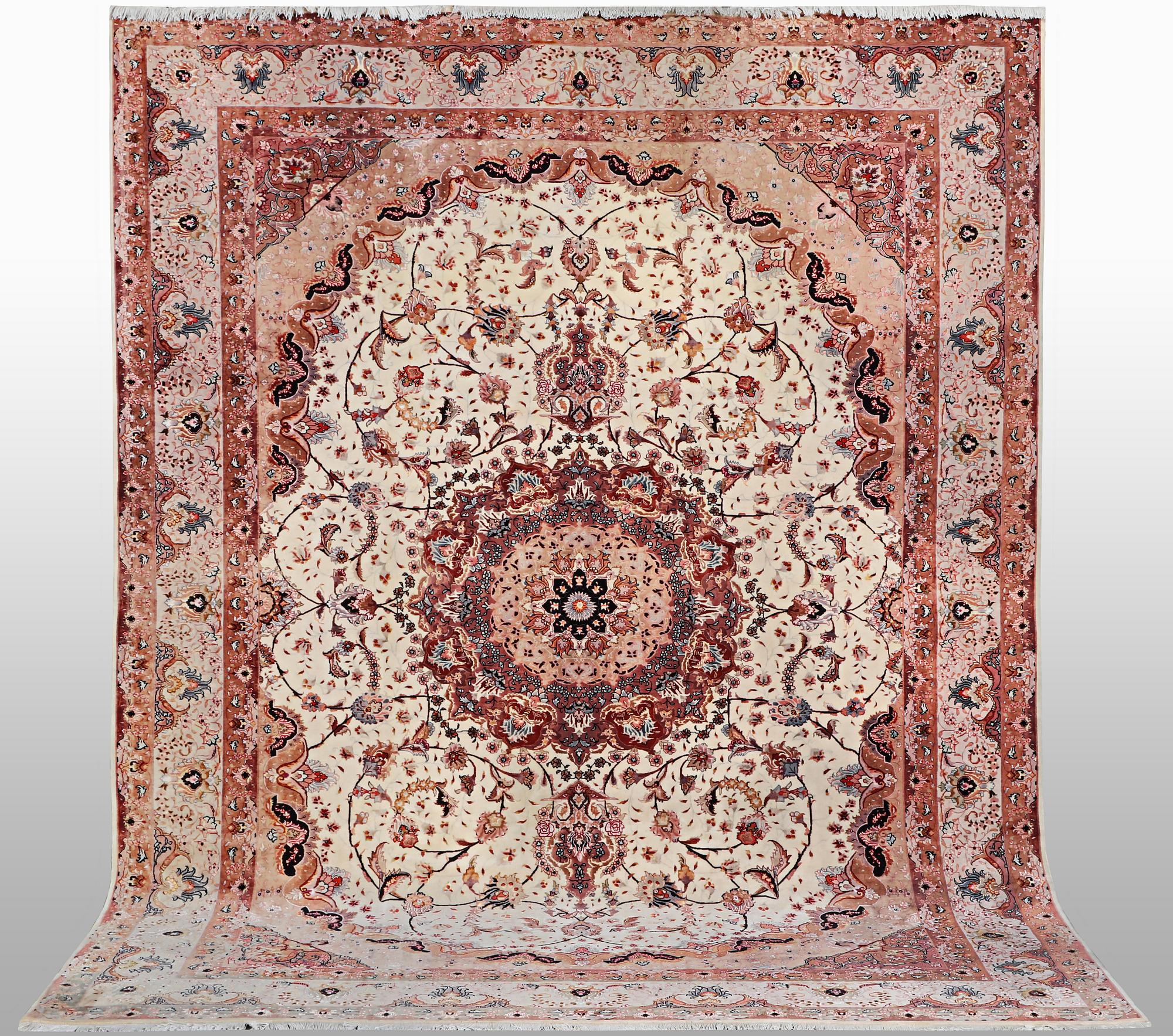A carpet, Tabriz, part silk, 50 Raj, ca 340 x 253 cm.