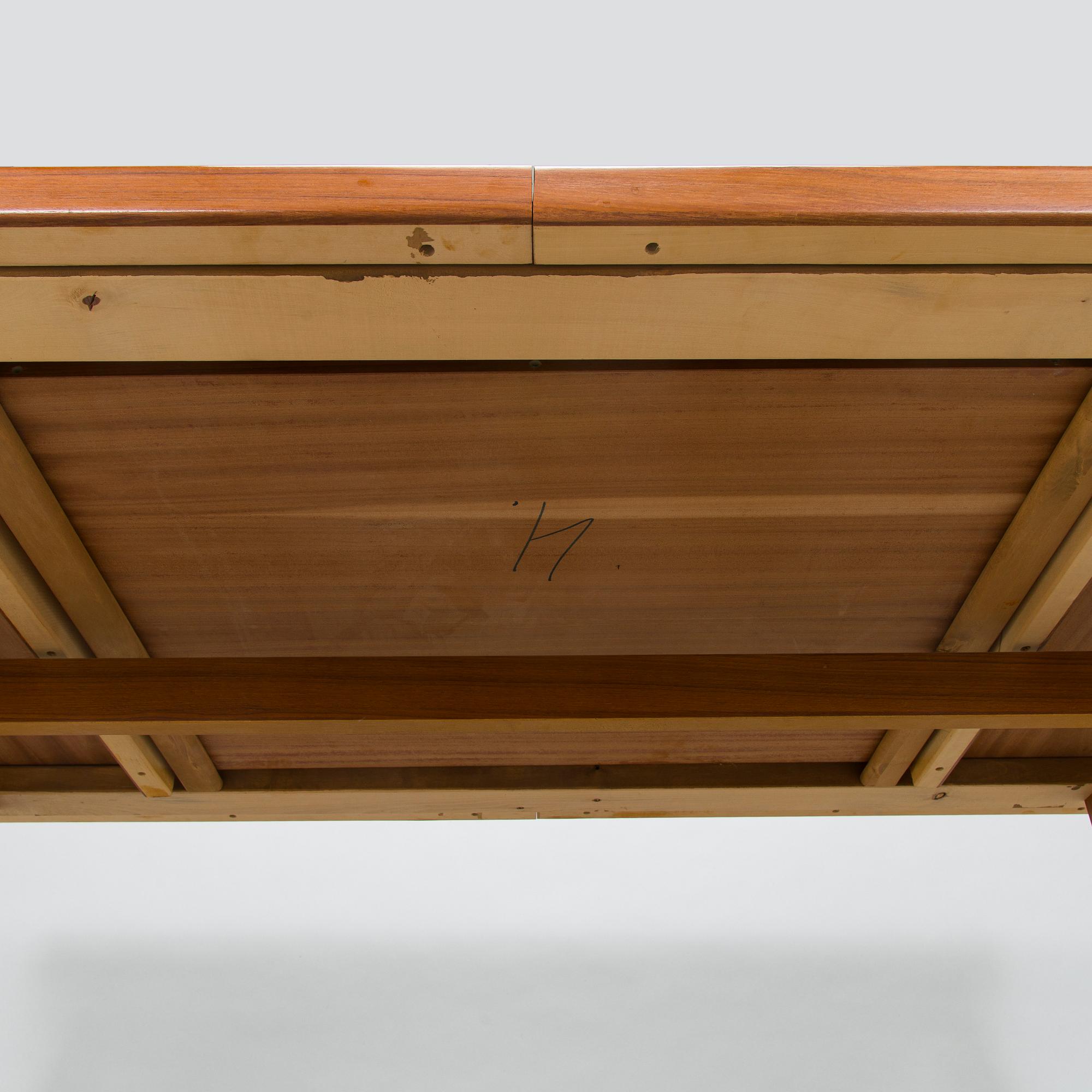 A mid-20th century dining table.