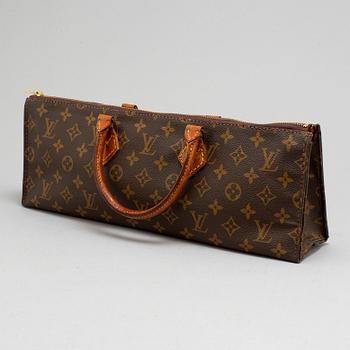 LOUIS VUITTON, a monogram canvas, 'Sac triangle' bag.