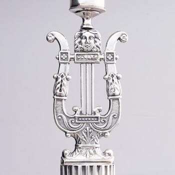 A pair of Swedish silver candlesticks, marks of Gustaf Folcker, Stockholm 1825.