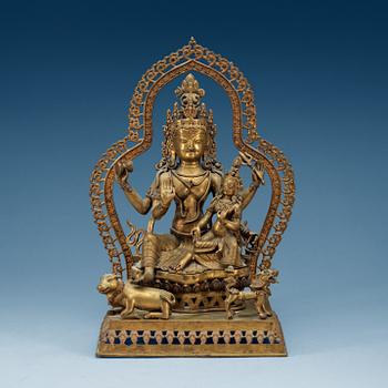 1860. An Indian bronze figure group representing Shiva Parvati, 19th Century.