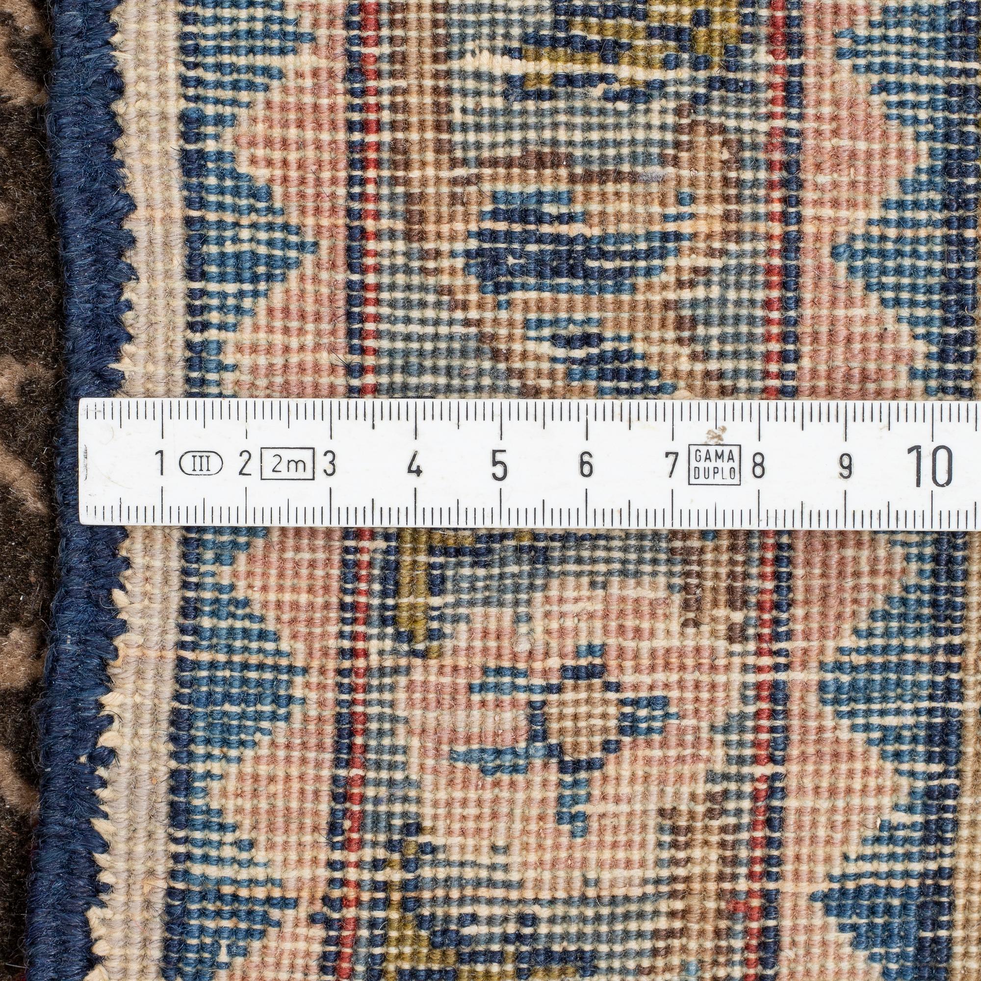 MATTO, a semi-antique Tabriz, ca 282,5-284,5 x 210-214,5 cm, inscriptions.