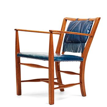 284. Josef Frank, a mahogany and blue leather chair for Firma Svenskt Tenn, Sweden probably 1950-60's.