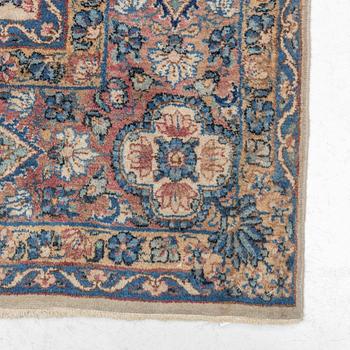 A semi-antique Kerman carpet, c. 273 x 172 cm.