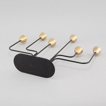 A candelabra, designed by Gunnar Ander for Ystad Metall, third quarter of the 20th century.