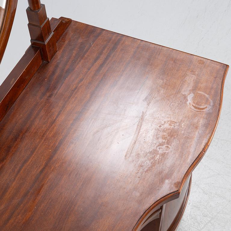 A mahogany veneered dressing table with a mirror, early 20th Century.