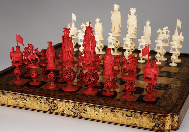 An large lacquered Games Box with ivory and bone Chess Pieces, Qing dynasty.