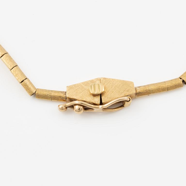 A necklace in 18K gold.