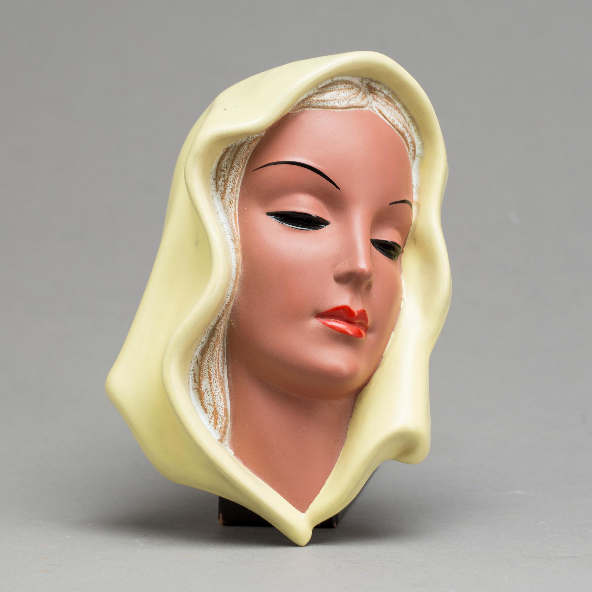 An Adolf Prischl terracotta wall mask for Goldscheider 1930'.