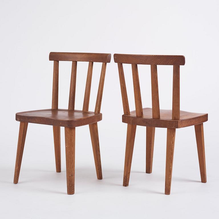 Axel Einar Hjorth, a set of six stained pine 'Utö' chairs, Nordiska Kompaniet, Sweden 1930s.