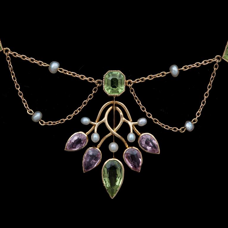 A pearl, peridote and pink tourmaline necklace. Circa 1900.