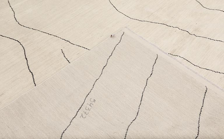 A Moroccan carpet, 335 x 258 cm.