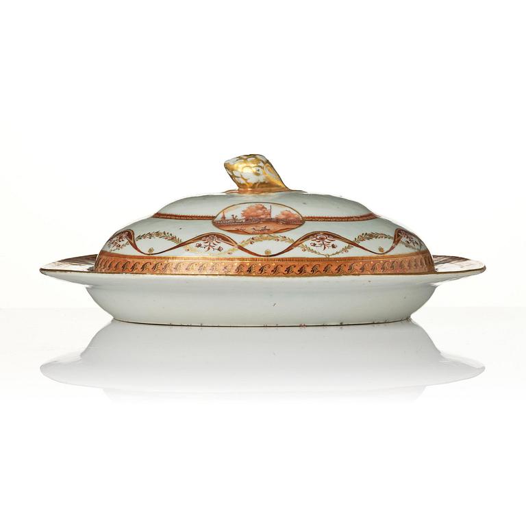 An oval vegetable tureen with cover and a pillow shaped bowl, Qing dynasty, late 18th century.