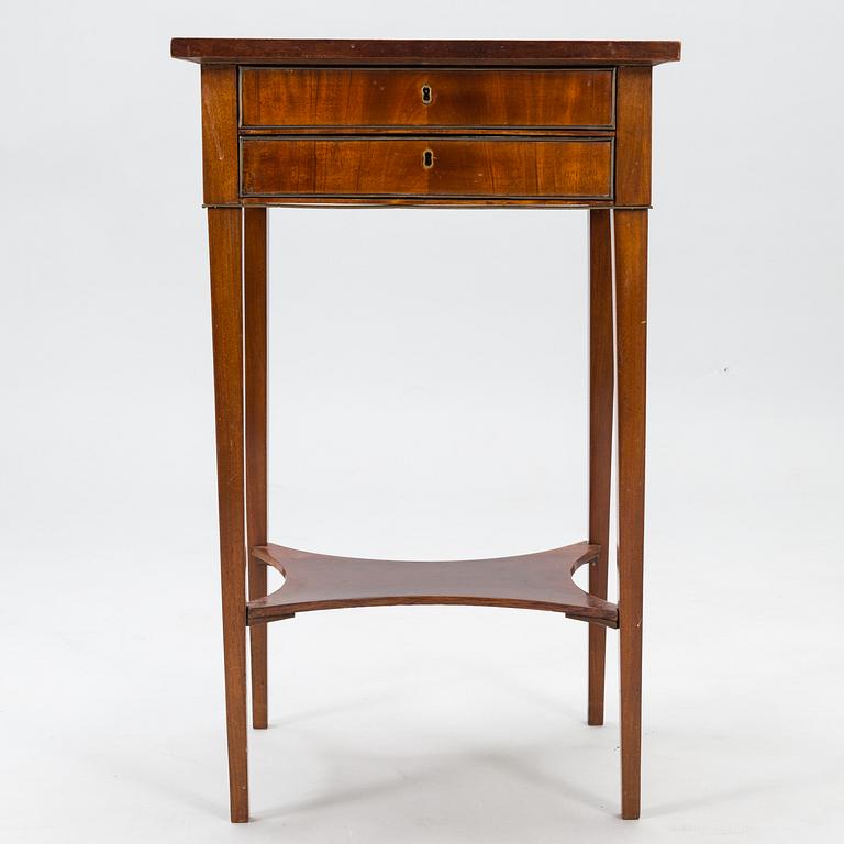 An early 19th century late Gustavian mahogany veneered table.