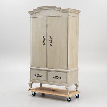 A cabinet, early 20th Century.