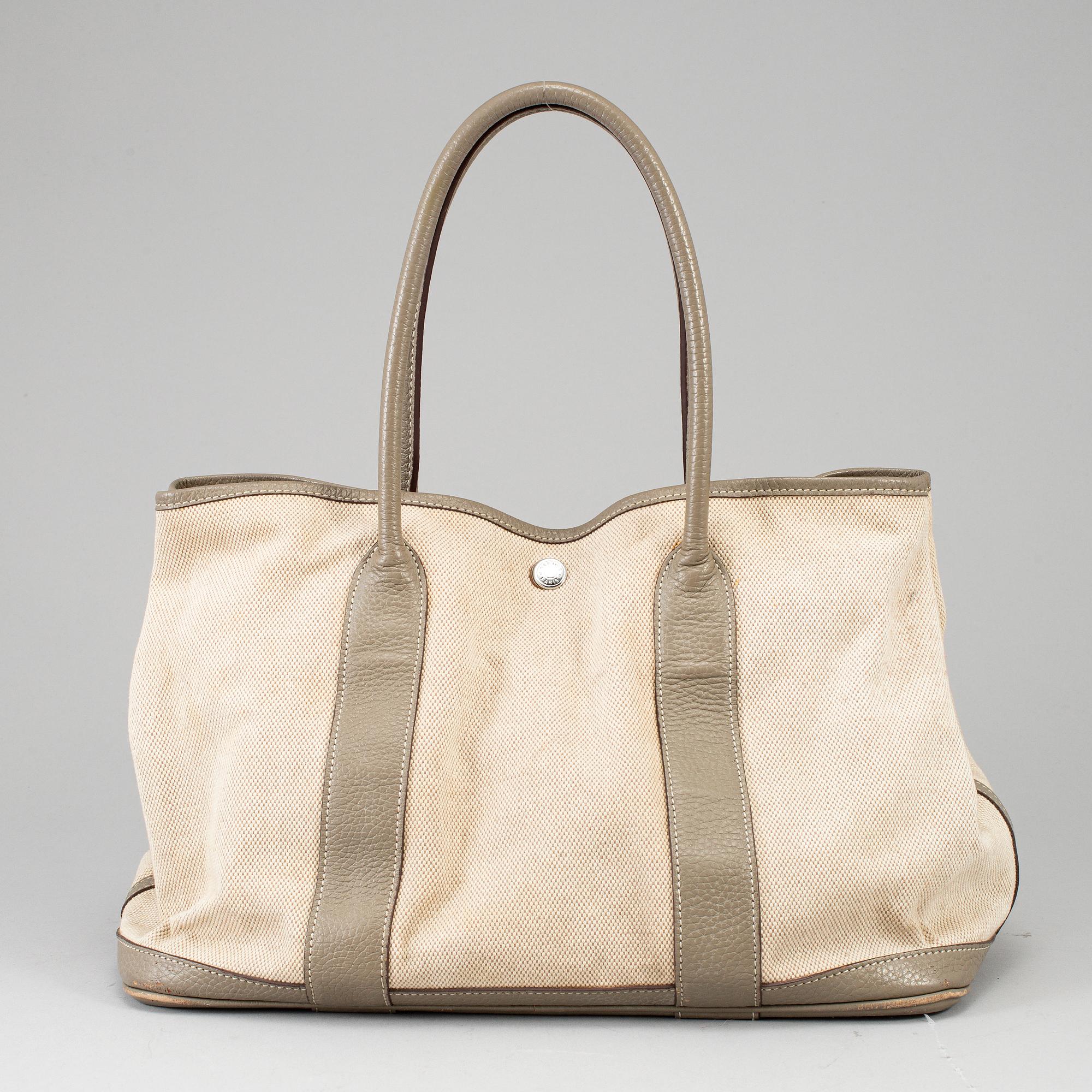HERMÈS, a canvas and leather 'Garden Party' bag.
