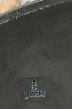 A Lladro stone ware figurine.