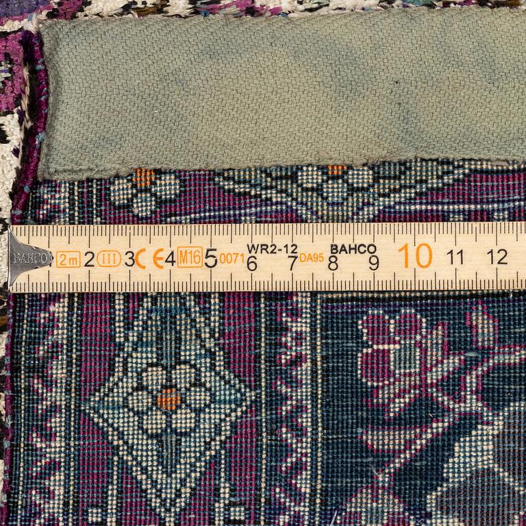 An antique silk Kashan rug, Central Persia, c. 207 x 131 cm.