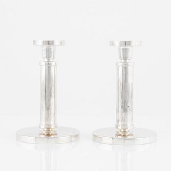 Rolf Carlman, a pair of sterling silver candlesticks, CF Carlman, Stockholm 1985.