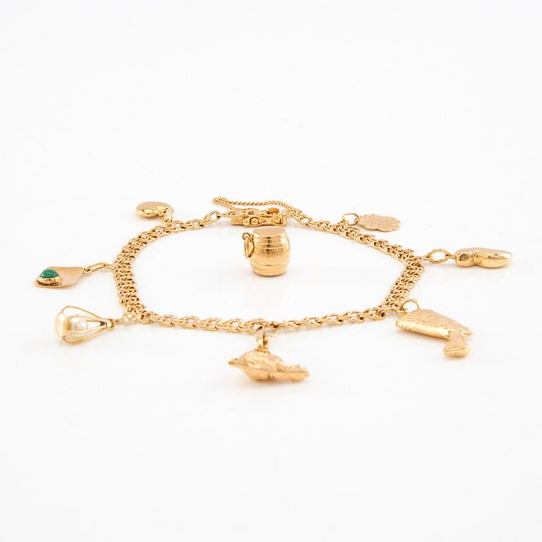 Armband Bismarck-länk 18K guld med berlocker.
