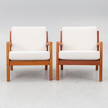 Carl Gustaf Hiort af Ornäs, a matched pair of 'Rialto' lounge chairs, Puunveisto Oy - Träsnideri Ab, Finland, mid-20th century.