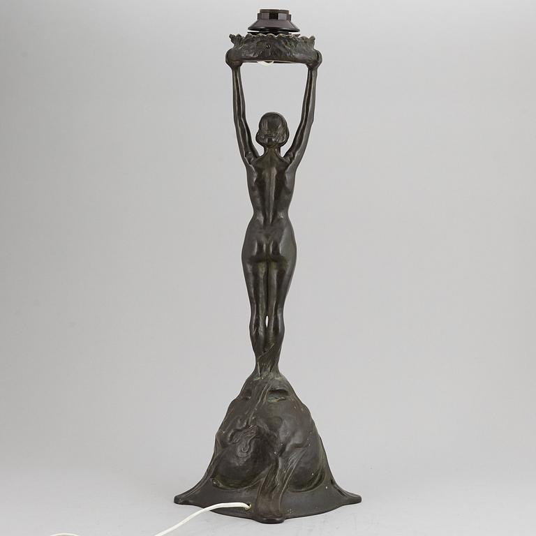 GERDA SPRINCHORN, an Art Nouveau green patinated bronze lamp "The Sun", Herman Bergman, Stockholm, early 20th century.