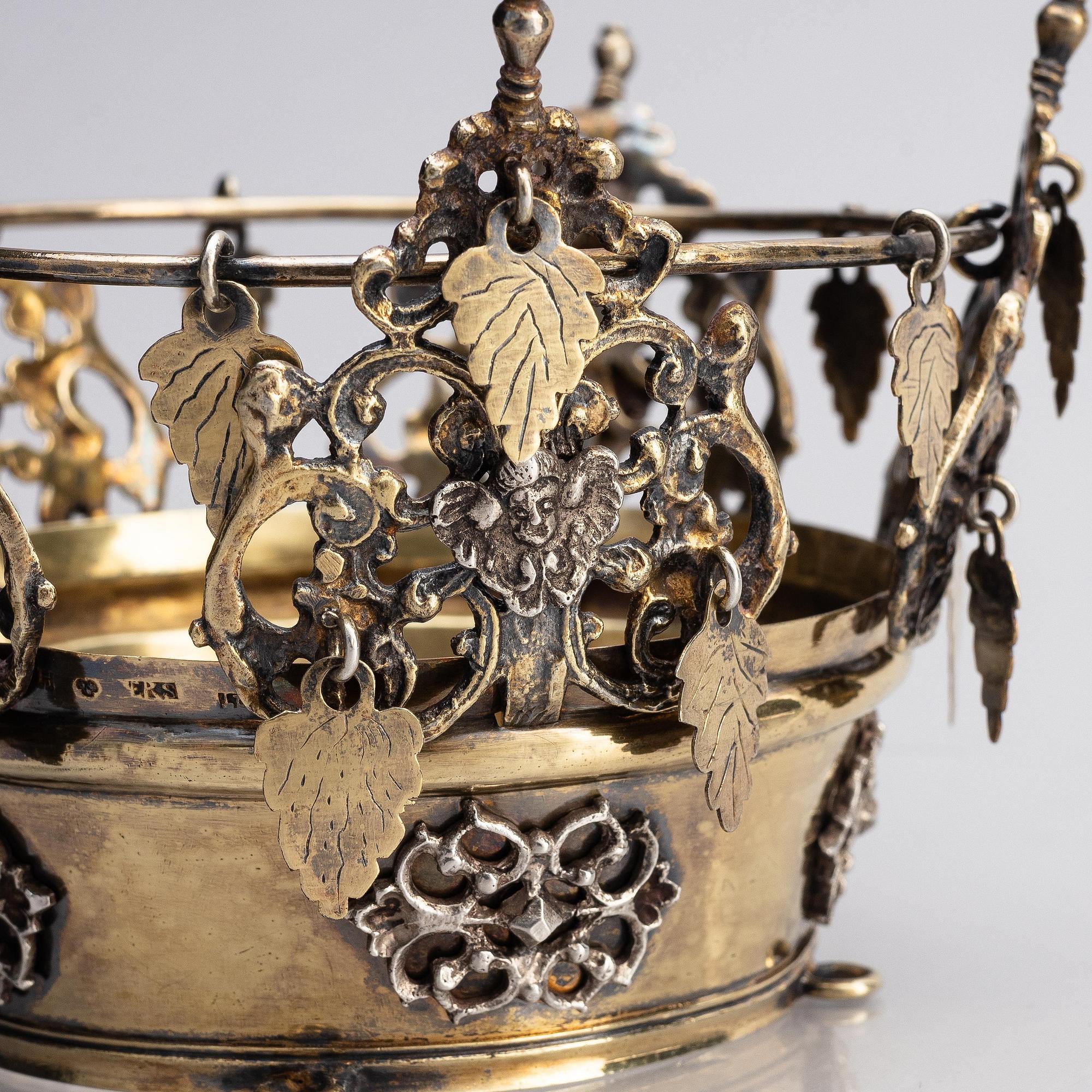 A Swedish early 19th century parcel-gilt silver bridal crown, mark of Erik Ramstedt, Härnösand 1801 and copper case.