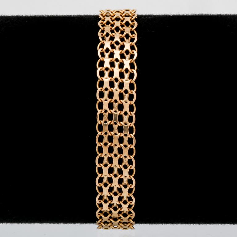 Bracelet 18k gold, 11,5 g, approx 19 x 1 cm.