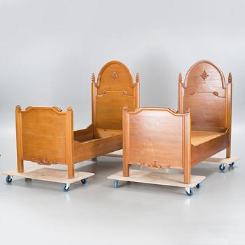 CARL CHRISTIAN CHRISTENSEN, a pair of jugend beds, signed and dated 1919.